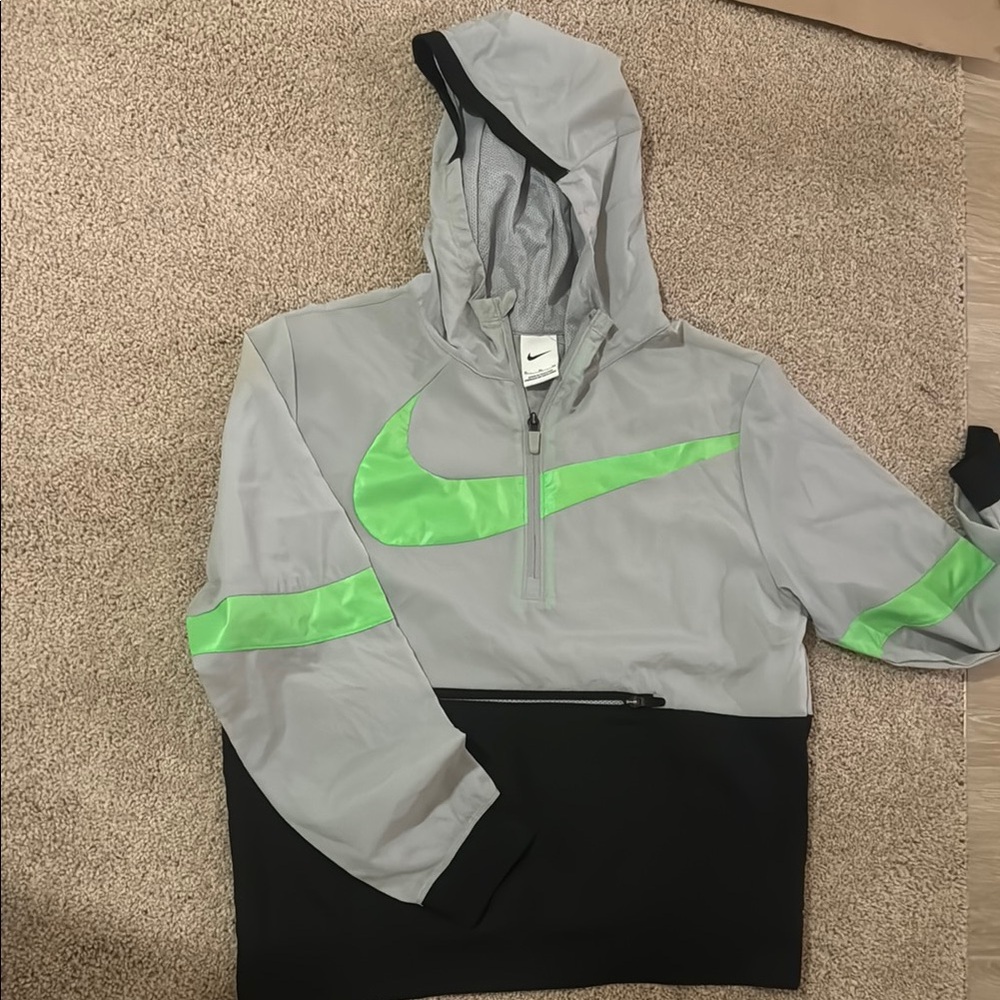 Nike Gray and Black Raincoat with Sleek Design